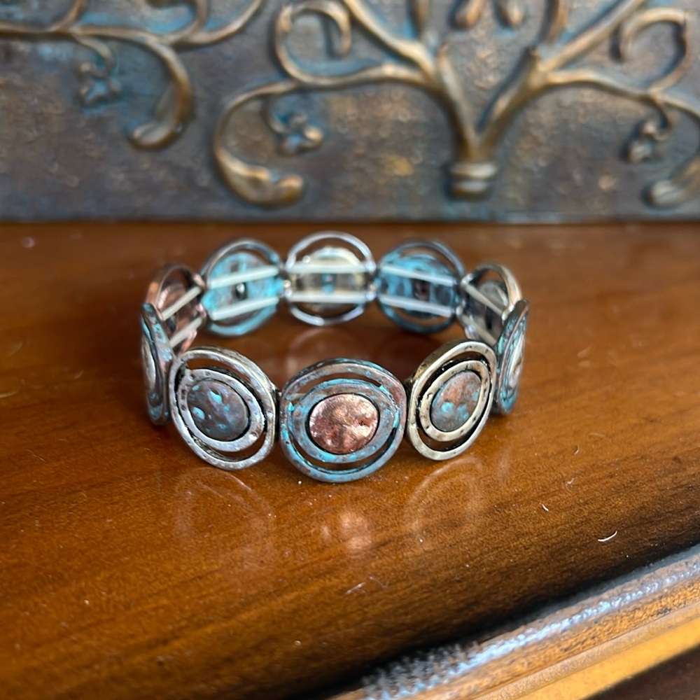 Artisan bracelet with turquoise copper and silver, gold colors
